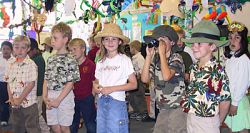 First graders teach others about the rainforest