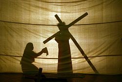 St. Patrick youth group prays the Stations in silhouette