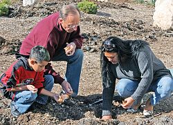 Children plant daffodils to remember loved ones