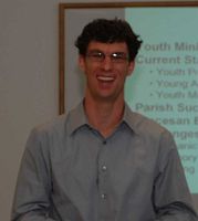 Members learn of religious education in two languages