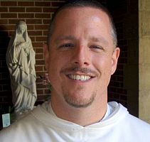 Father Carl returns to U's Newman Center