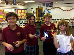 Saint Olaf Catholic School fourth-graders make Christmas happen for homeless animals this year