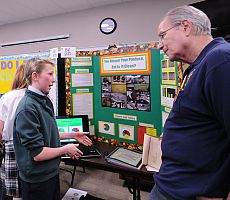 Gymnast stretches to win top science fair award