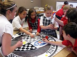 Artist teaches St. Vincent Paul students to work with glass