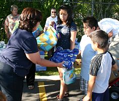 Ladies of Charity distribute back-to-school backpacks