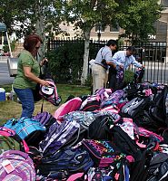 Catholic Community Services collects backpacks