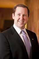 Judge Memorial graduate receives Pro Bono Attorney of the Year award