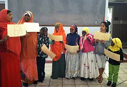 Cultures come together for refugee holiday party