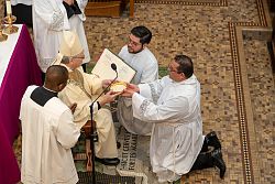 Three seminarians instituted as acolytes; one offers reflection on this step toward ordination as a priest 