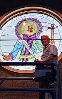 Stained-glass window of patron saint installed at St. Olaf Catholic School in Bountiful