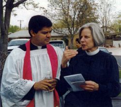 Ministers and members participate in a Good Friday Ecumenical Way of the Cross in St. George