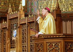 A wooden manger and a vulnerable baby