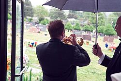 Catholics assemble Memorial Day at Mount Calvary cemetery to 'deepen relationships'