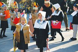 Students celebrate Thanksgiving with pie, turkey, and butter