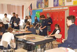 Students enjoy collecting money for a family in need