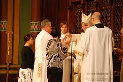 Holy oils blessed at Chrism Mass, vows and promises renewed