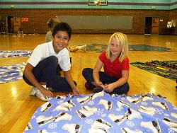 Kids quilt to show they care
