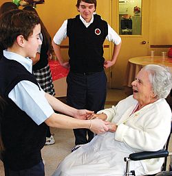 Seniors and eighth graders share companionship, advice and dance