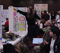 Gymnast stretches to win top science fair award