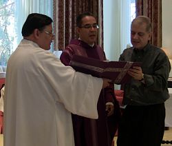 Diocesan priests practice new Roman Missal
