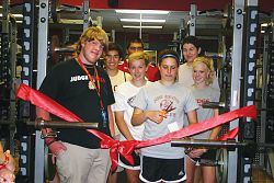 Judge Memorial students christen new weight room
