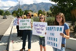 Catholics gather to form a life chain for the unborn