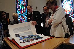 Handwritten, illuminated Bible on display in SLC