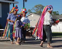 Dancers honor the Virgin Mary with indigenous traditions