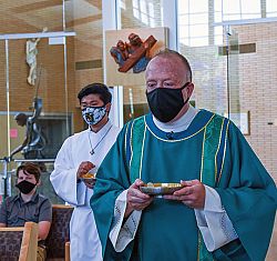 St. Joseph theology teacher ministers at St. John the Baptist Parish while discerning priesthood call