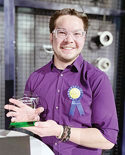 Judge tennis coach receives sportsmanship award