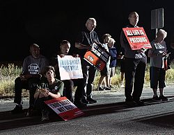 As the State of Utah executes Taberon Honie, local Catholics raise their voices against death penalty: Catholics pray outside prison prior to execution