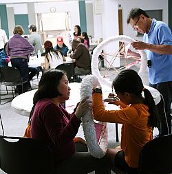 Crafting traditional decoration helps local Filipinos prepare for Christmas novena